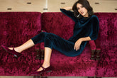 Soft velvet blouse with three-quarter sleeves and tailored fit for elegant occasion styling